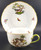 Herend Rothschild Bird (RO) Flat Cup and Saucer Set, 2". Hand-painted porcelain with gold scrollwork and birds, Design 11.