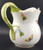 Herend Rothschild Bird (RO) 16 Oz Pitcher, 4 3/8". View of green handle.