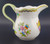 Herend Queen Victoria Green Border Creamer side view, porcelain pitcher with multicolor butterfly and floral design, gold rim, 3 7/8 inch height