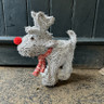 Small grey brushwood reindeer with scarf, red nose & plant area