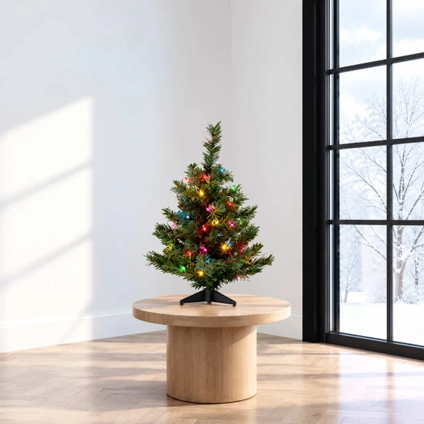 3-foot Colorado Spruce Multi Christmas tree on a tabletop in a modern room