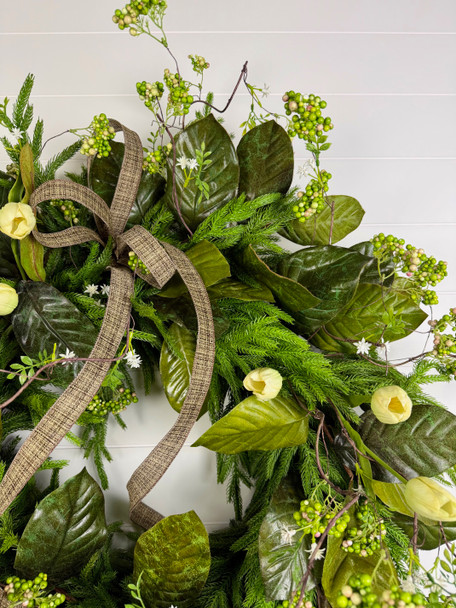 30" Green Magnolia Leaf & Norfolk Wreath w/Natural Touch Cream Tulips, Green Sedum Berries & Bow