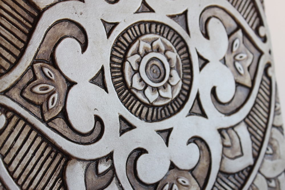 These decorative tiles make wonderful wall hangings and outdoor wall art.  Our silver handmade tiles are carved in relief and handmade in Spain.