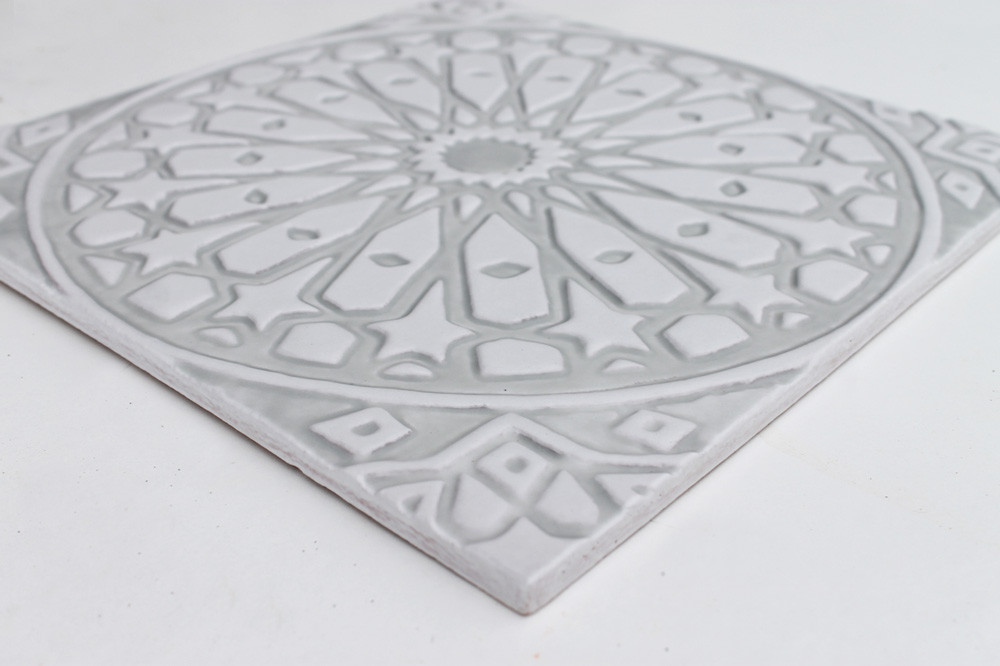 Handmade moroccan tile for kitchens, bathrooms and outdoor wall art. Decorative tile handmade in Spain. Relief tile glazed in grey and white.