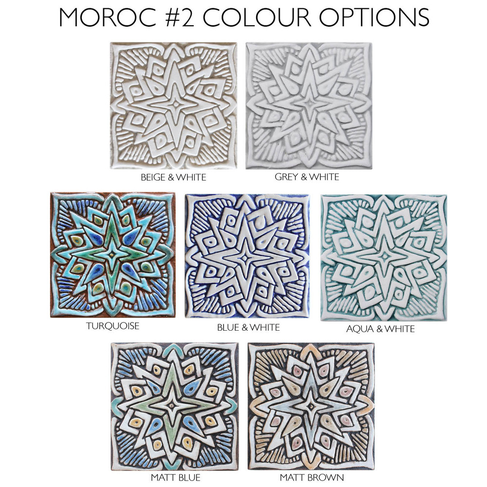 Handmade tile for kitchens, bathrooms and outdoor wall art. Decorative tile handmade in Spain in aqua & white.