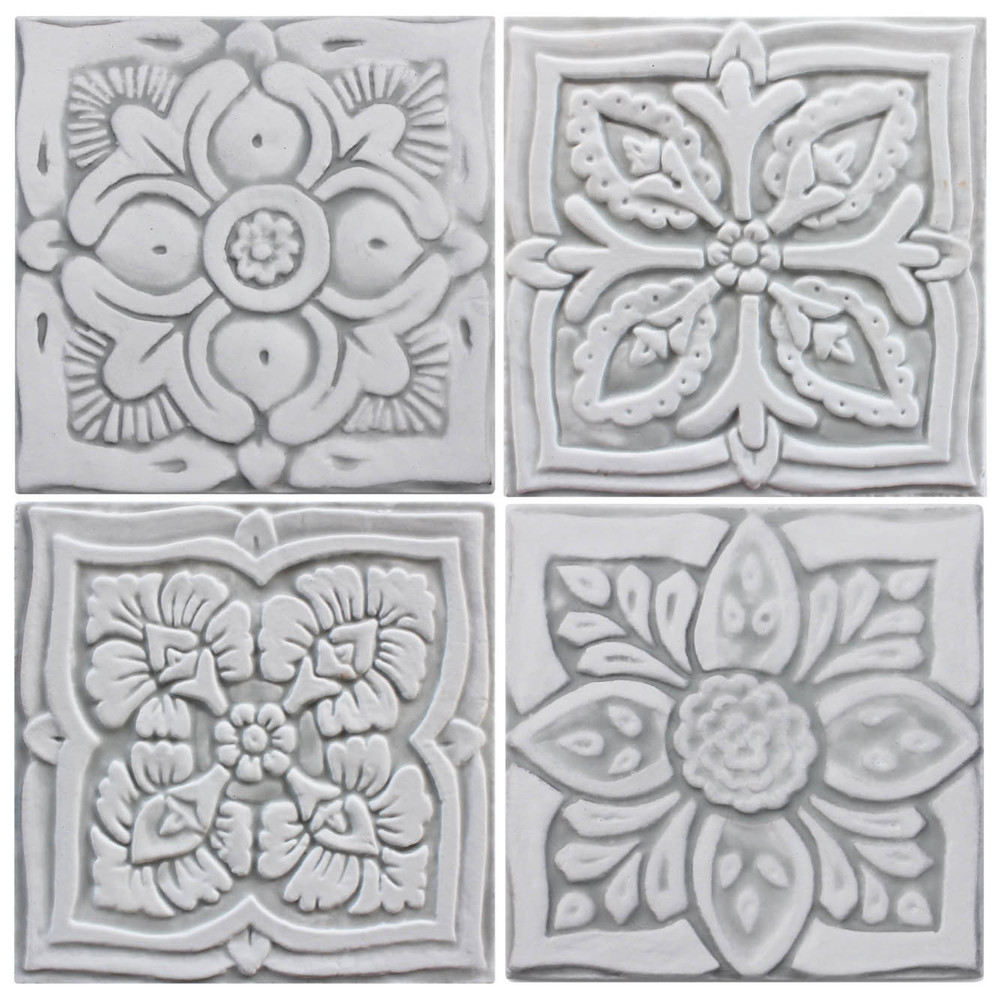 Handmade tile for kitchens, bathrooms and outdoor wall art. Decorative tile handmade in Spain. Relief tile glazed in grey and white.