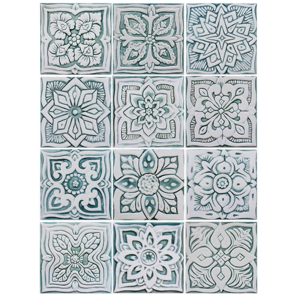 Handmade tile for kitchens, bathrooms and outdoor wall art. Decorative tile handmade in Spain. Relief tile glazed in aqua and white.