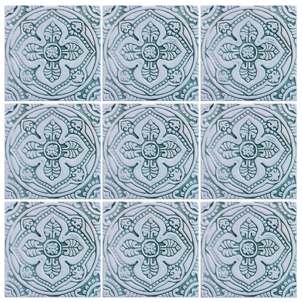 Handmade tile for kitchens, bathrooms and outdoor wall art. Decorative tile handmade in Spain. Relief tile glazed in aqua and white.