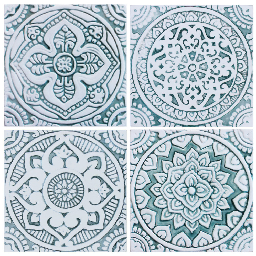 Handmade tile for kitchens, bathrooms and outdoor wall art. Decorative tile handmade in Spain. Relief tile glazed in aqua and white.