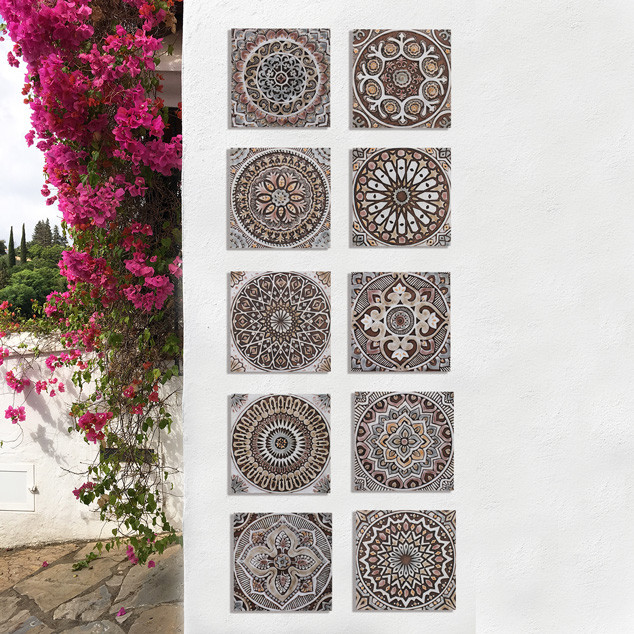 These decorative tiles make wonderful wall hangings and outdoor wall art.  These handmade Spanish tiles are carved in relief and glazed in matt brown and finished in aged effect.