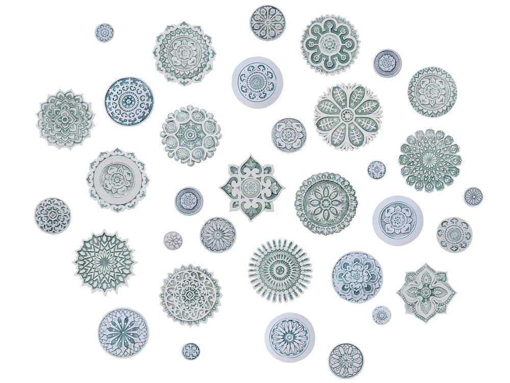 These circular tiles make beautiful outdoor wall art.  Ceramic wall art for kitchens, bathrooms and wall decor. Our decorative tiles can also be combined with our other handmade tiles to make larger wall art installations.