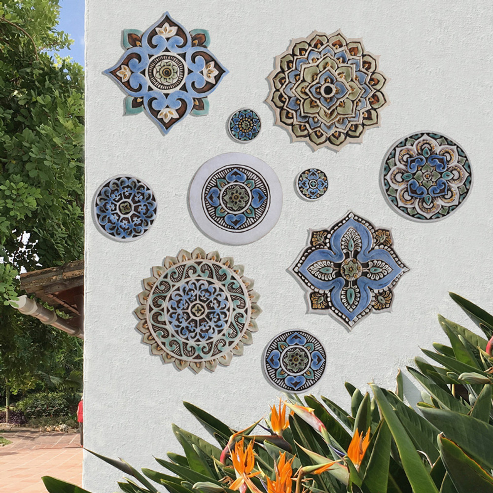 Create your unique wall art installation with these circular handmade tiles. Ceramic wall art for kitchens, bathrooms and outdoor wall decor. Our decorative tiles make a beautiful wall art installations when combined together.