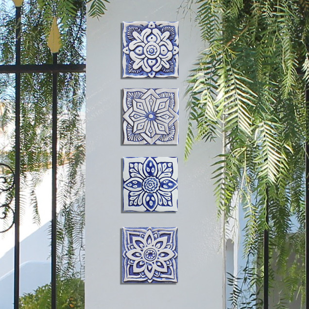 Blue and white handmade tile with relief for kitchens, bathrooms and outdoor wall art. Decorative tile handmade in Spain.