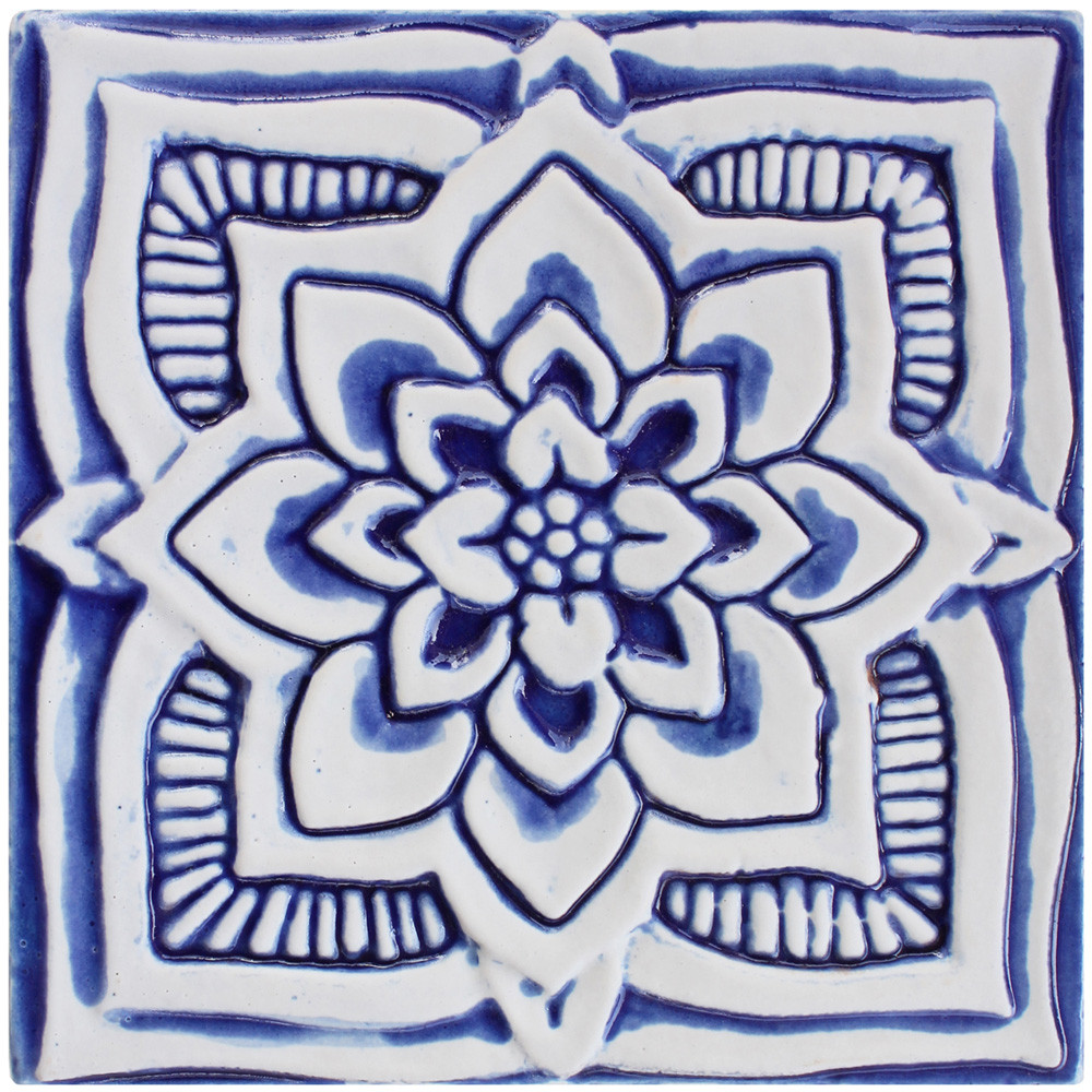 Blue and white handmade tile with relief for kitchens, bathrooms and outdoor wall art. Decorative tile handmade in Spain.