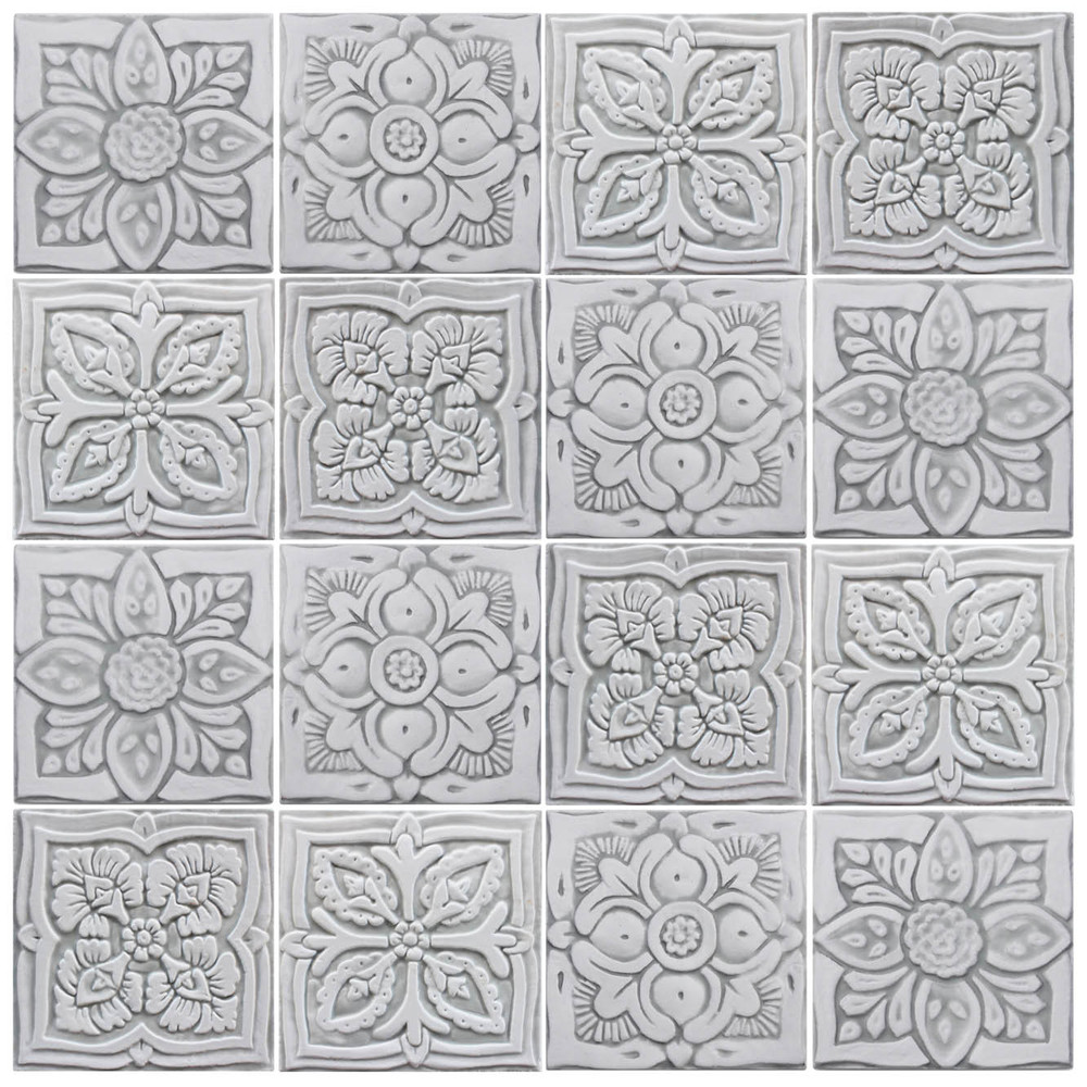 Handmade tile for kitchens, bathrooms and outdoor wall art. Decorative tile handmade in Spain. Relief tile glazed in grey and white.