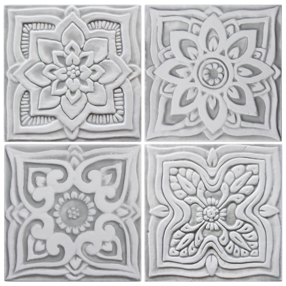 Handmade tile for kitchens, bathrooms and outdoor wall art. Decorative tile handmade in Spain. Relief tile glazed in grey and white.