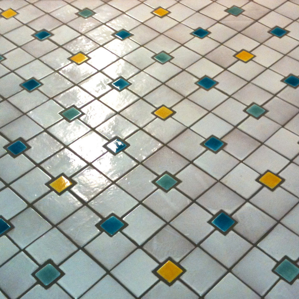 Mosaic table made from Handmade tiles.  Custom designed ceramic table, handmade in Spain.