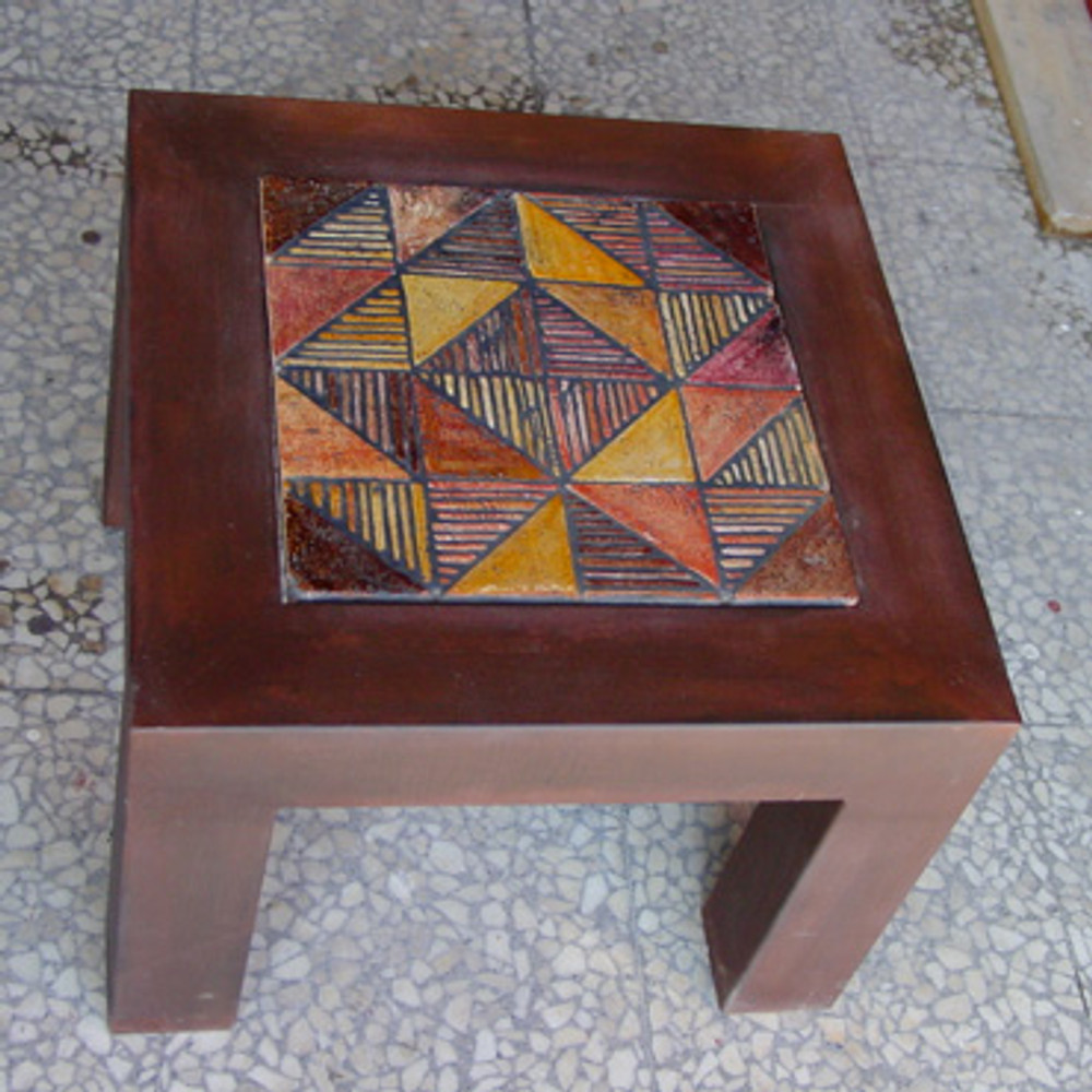 Mosaic table made from Handmade tiles.  Custom designed ceramic table, handmade in Spain.