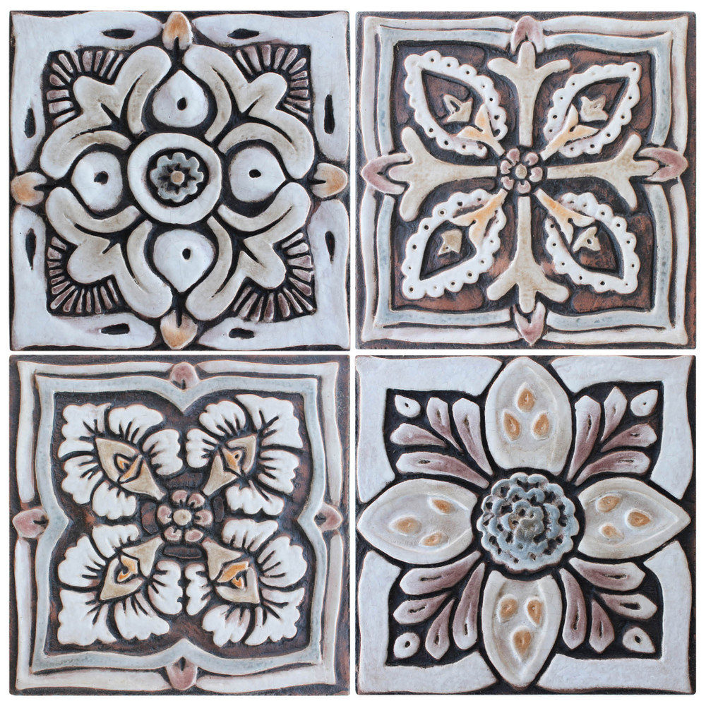 These decorative tiles make wonderful wall hangings and outdoor wall art.  These handmade Spanish tiles are carved in relief and glazed in matt brown.