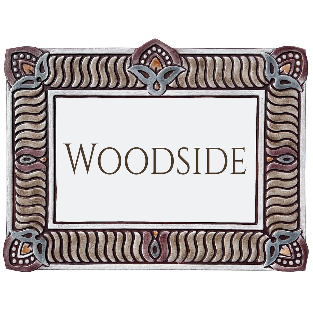 House sign made from ceramic with carved Tulip design. T