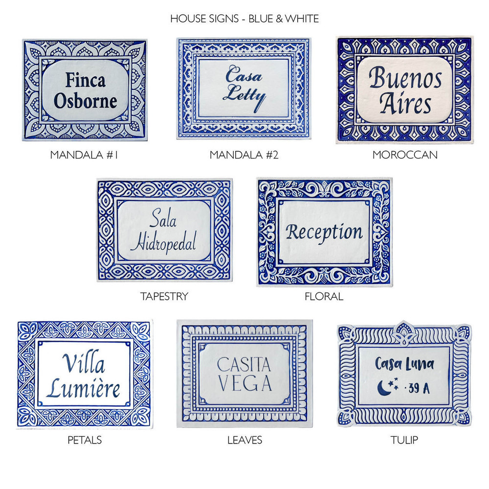 Blue and white house sign made from ceramic with petals design.