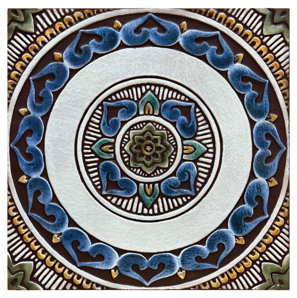 hese handmade tiles make outdoor wall art.  Decorative tile handmade in Spain.