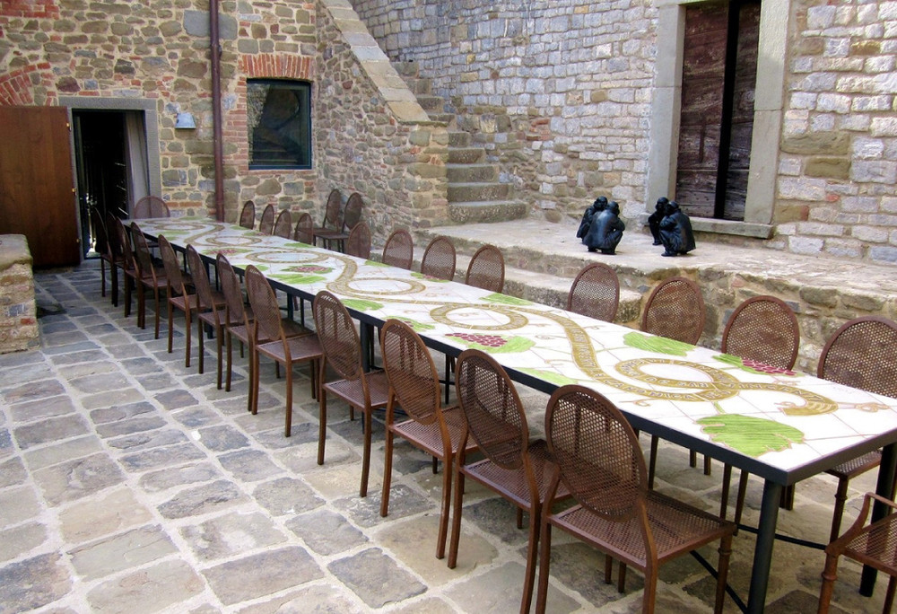 Mosaic table made from Handmade tiles.  Custom designed ceramic table, handmade in Spain.