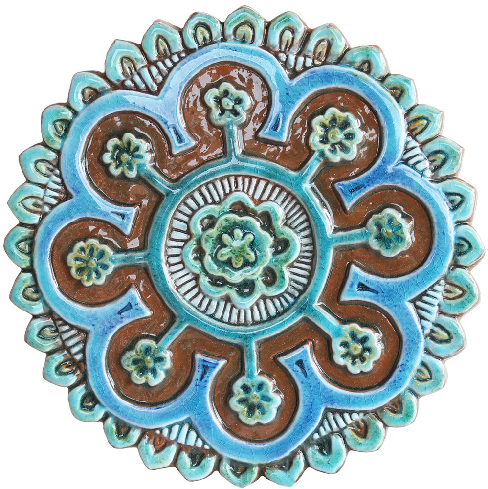 These handmade tiles make a unique wall art installation.  Our decorative tiles are glazed in turquoise and make wonderful outdoor wall art. Perfect for decorating a white wall. Circle garden decor handmade in Spain.