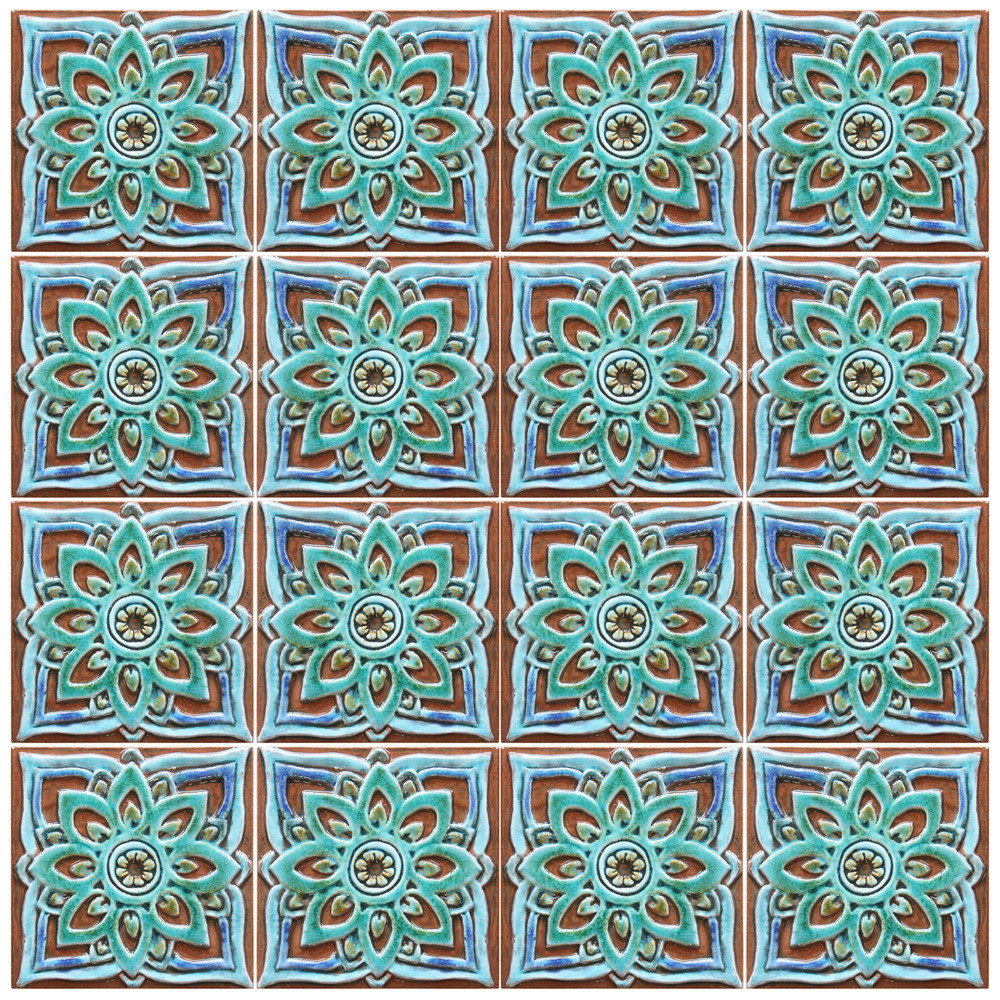 Turquoise handmade tile with decorative relief. Decorative tile handmade in Spain.