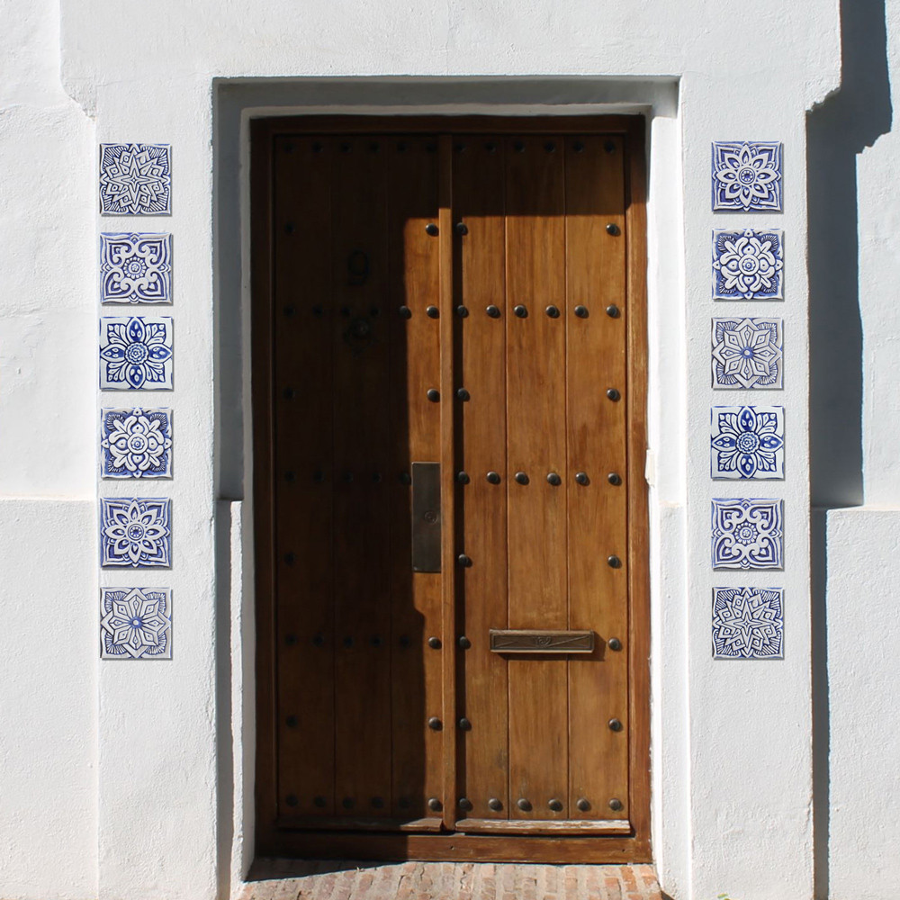 Blue and white handmade tile with relief for kitchens, bathrooms and outdoor wall art. Decorative tile handmade in Spain.