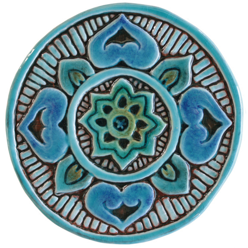 These handmade tiles make a unique wall art installation.  Our decorative tiles make wonderful outdoor wall art, either on a garden column or home entrance. Turquoise circle garden decor handmade in Spain.