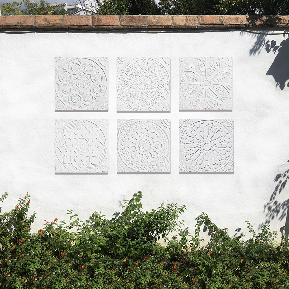 These handmade tiles are for kitchens and bathrooms.  These decorative tiles also make wonderful wall hangings and outdoor wall art.  Our white relief tiles are handmade in Spain.