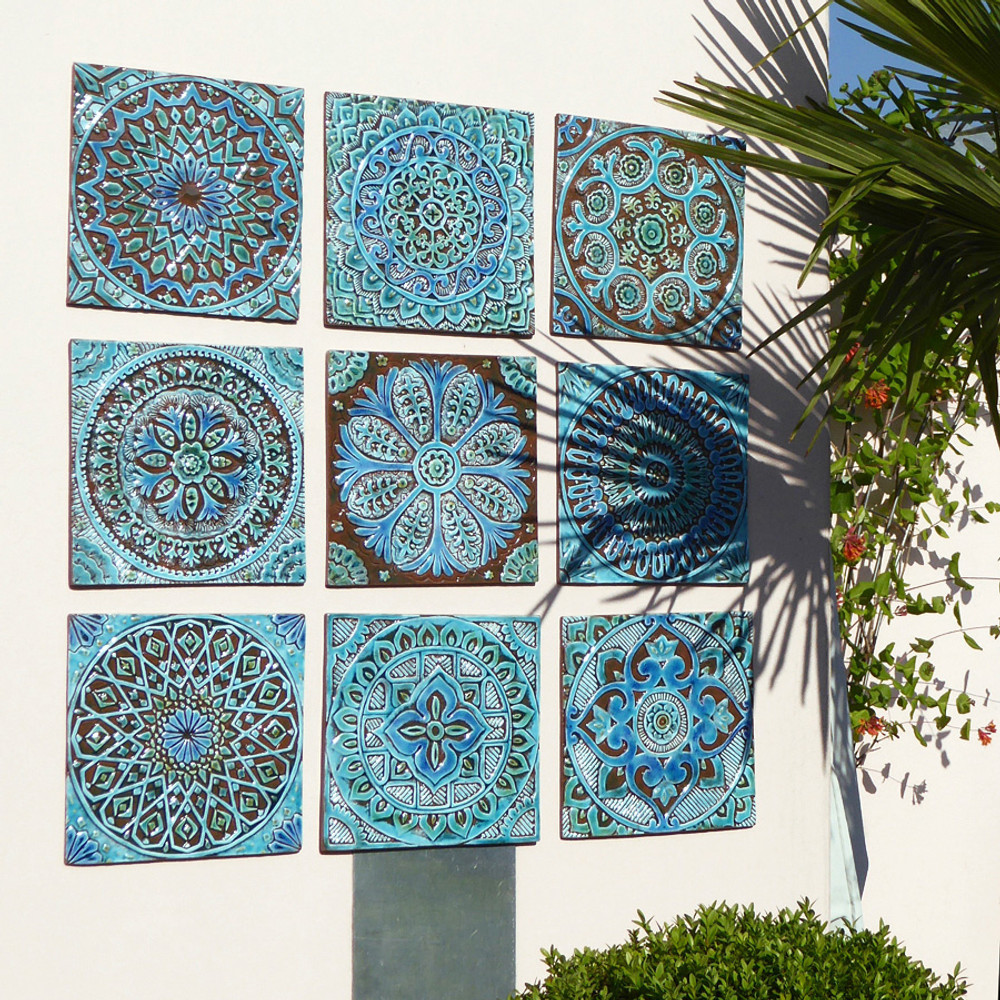 Outdoor wall art. Turquoise handmade tile with decorative relief. Large decorative tile with Mandala design.