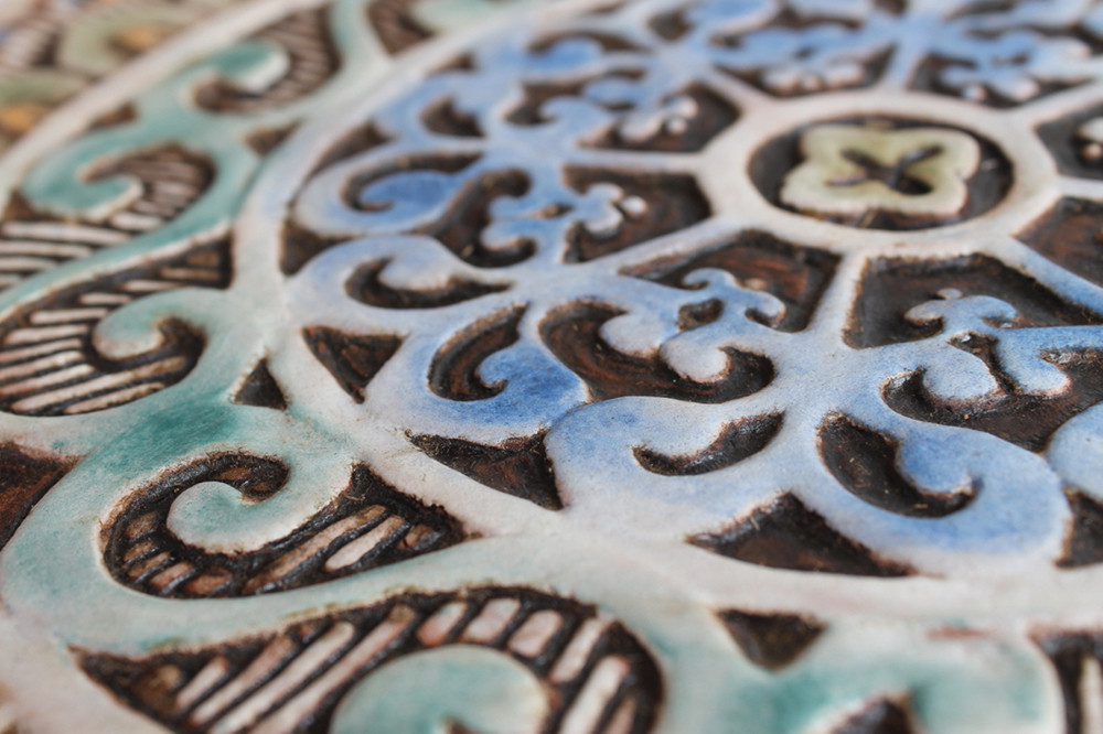 These handmade tiles make outdoor wall art.  Decorative tile handmade in Spain.