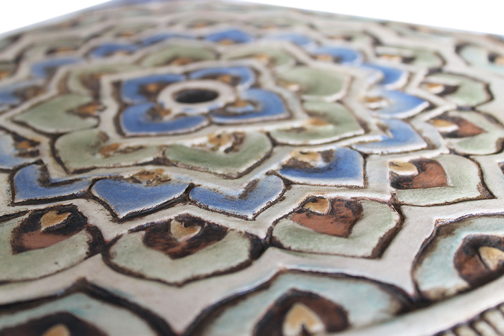 These handmade tiles make outdoor wall art.  Decorative tile handmade in Spain.