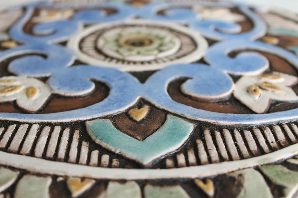 These handmade tiles make outdoor wall art.  Decorative tile handmade in Spain.