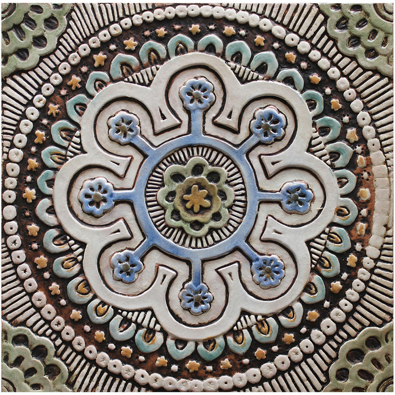These handmade tiles make outdoor wall art.  Decorative tile handmade in Spain.