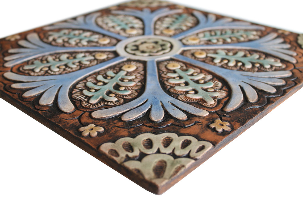 These handmade tiles make outdoor wall art.  Decorative tile handmade in Spain.