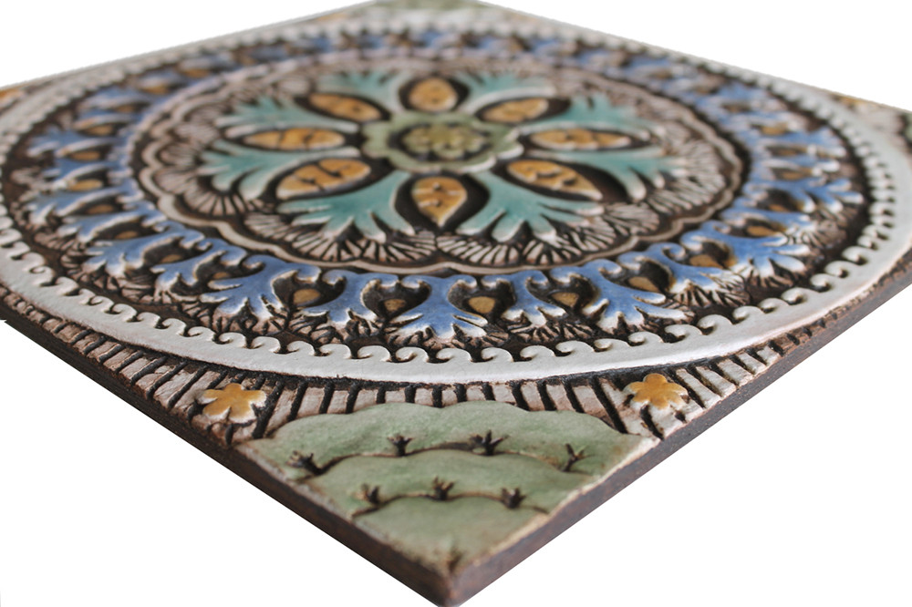 These handmade tiles make outdoor wall art.  Decorative tile handmade in Spain.