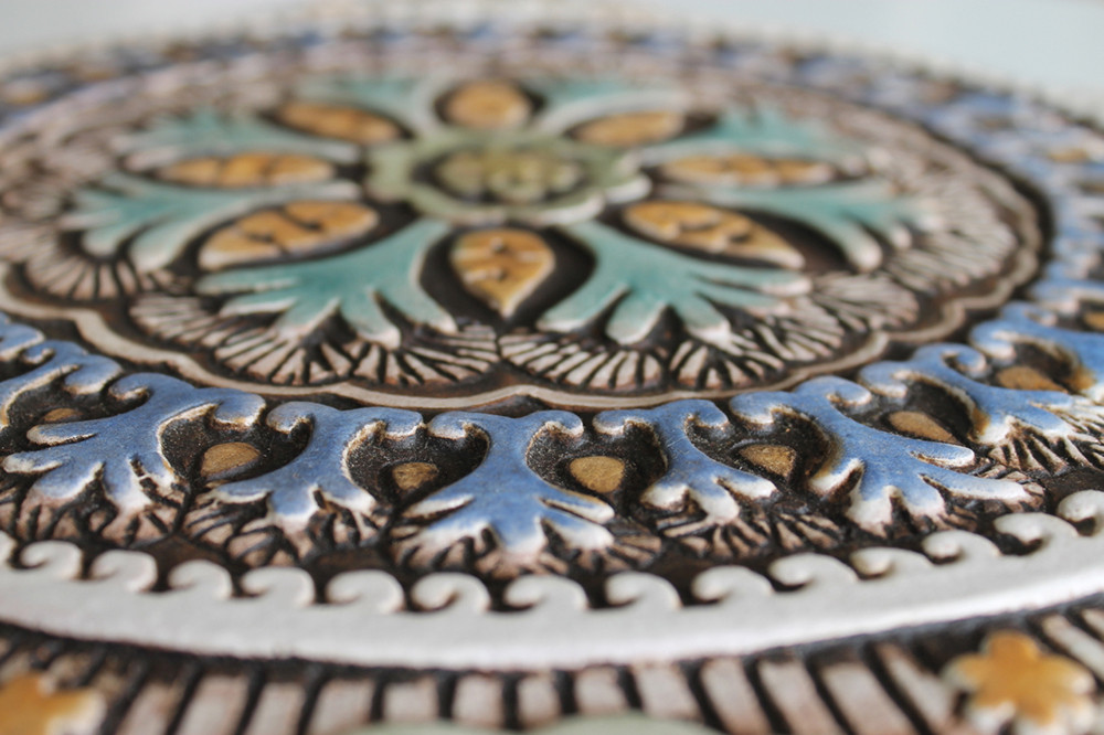 These handmade tiles make outdoor wall art.  Decorative tile handmade in Spain.