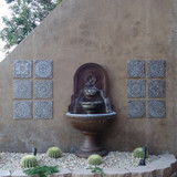 Ceramic wall art installation with Handmade tiles.  Decorative tiles used as outdoor wall art.  Spanish tile wall decor.