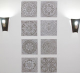 Ceramic wall art installation with Handmade tiles.  Decorative tiles used as outdoor wall art.  Spanish tile wall decor.