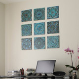 Ceramic wall art installation with Handmade tiles.  Decorative tiles used as outdoor wall art.  Spanish tile wall decor.