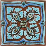 Turquoise handmade tile with decorative relief. Decorative tile handmade in Spain.