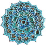 These handmade tiles make unique wall art for kitchens and bathrooms. Our decorative turquoise circle tiles make wonderful outdoor wall art, perfect for garden or terrace walls.
