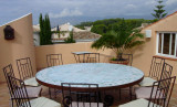 Mosaic table made from Handmade tiles.  Custom designed ceramic table, handmade in Spain.