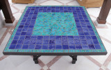 Mosaic table made from Handmade tiles.  Custom designed ceramic table, handmade in Spain.