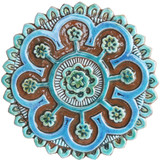 These handmade tiles are glazed in turquoise and make unique wall hangings for kitchens and bathrooms. Our decorative tiles also make wonderful outdoor wall art.  Circle garden decor handmade in Spain.