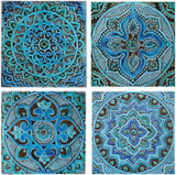 Turquoise handmade tile with decorative relief. Large decorative tile with Mandala design.