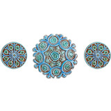 These handmade tiles make a unique wall art installation.  Our decorative tiles make wonderful outdoor wall art, either on a garden column or home entrance. Turquoise circle garden decor handmade in Spain.